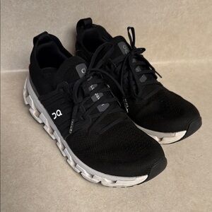 On Running Woman’s Black and White Athletic Shoes